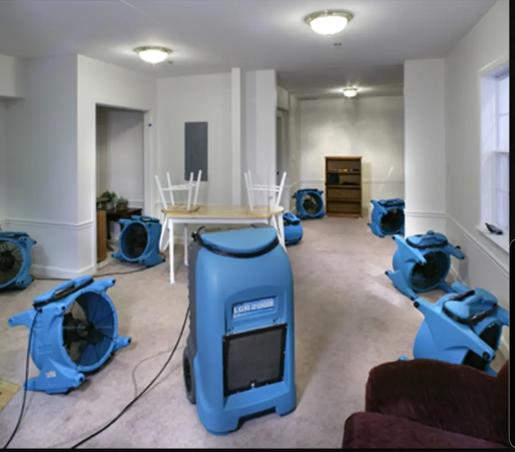 Air movers and dehumidifier setup for Water Damage Restoration in Haverhill